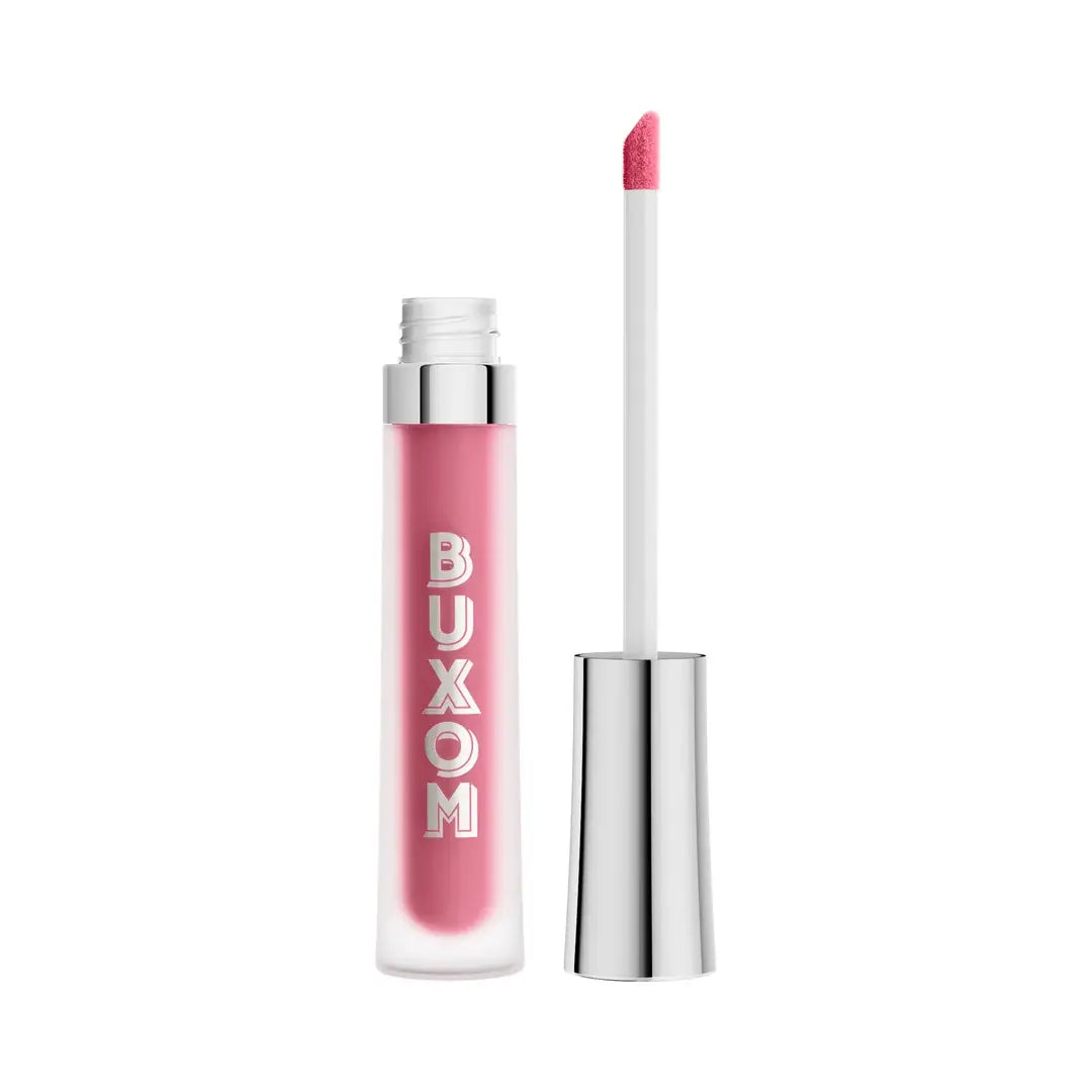 BUXOM liquid lipstick in a translucent pink shade with a silver cap, shown open with the applicator wand beside it on a white background.