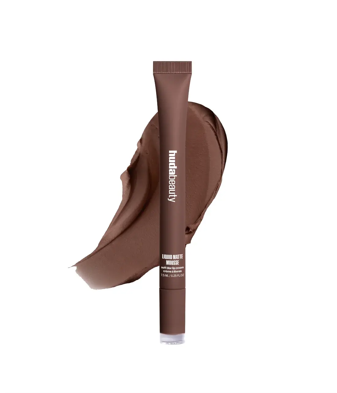 A tube of Huda Beauty liquid bronzer in a medium brown shade, shown vertically in front of a matching liquid bronzer swatch on a plain white background.