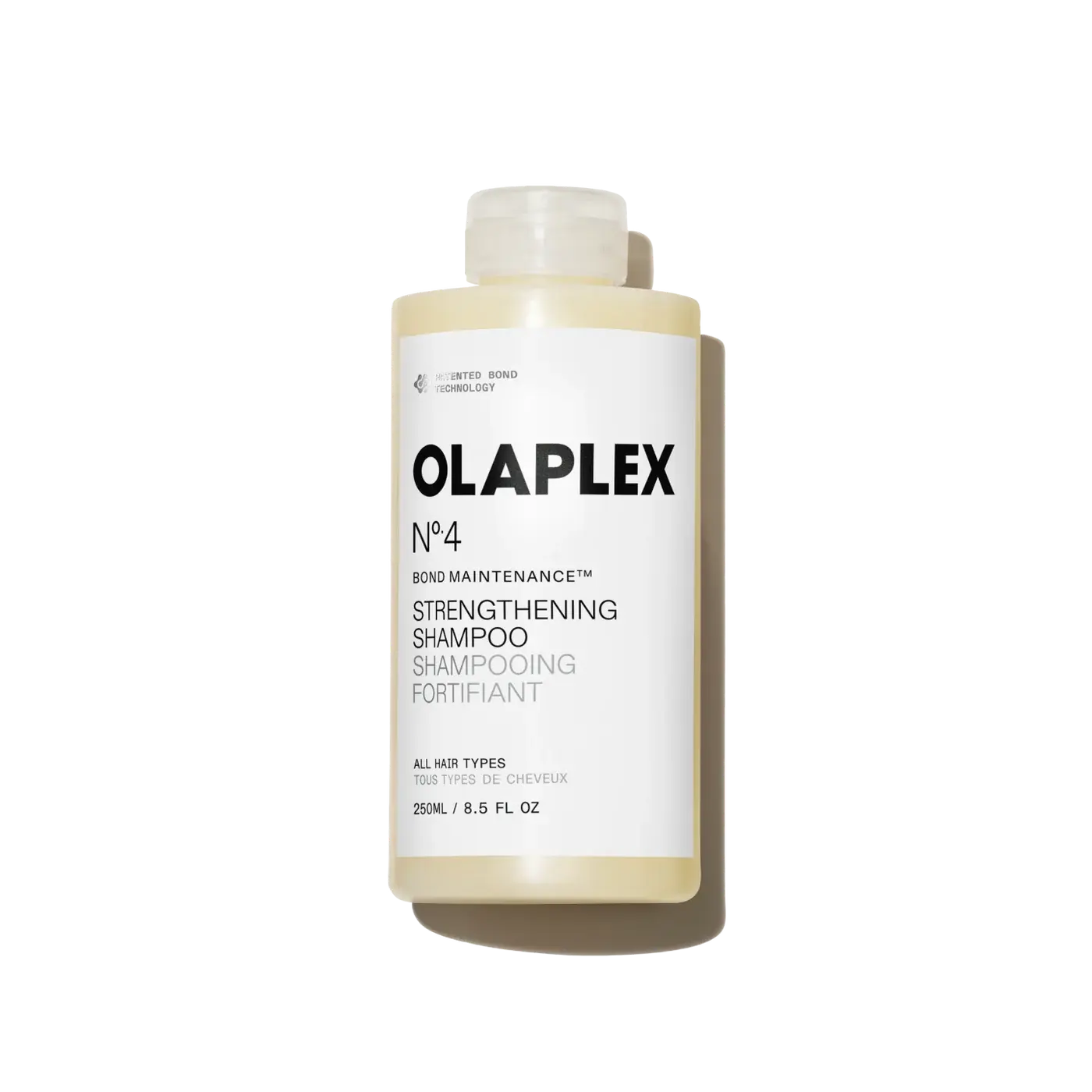 A 250 mL bottle of Olaplex No. 4 Bond Maintenance Strengthening Shampoo, featuring a white label with black text and a translucent cap, set against a plain white background with a soft shadow.