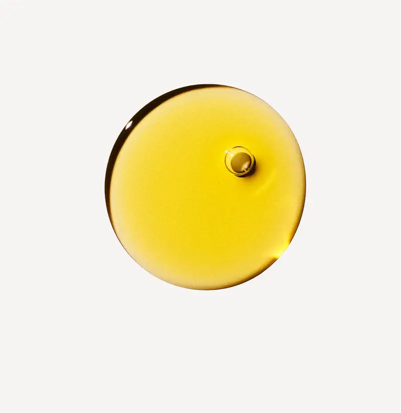 Texture of OLAPLEX No. 7 Bonding Oil 30ml on a white background